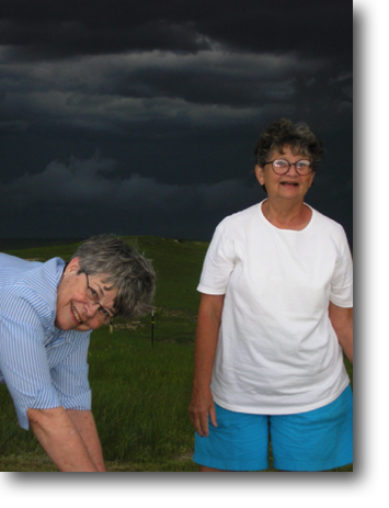 Jackie and Mom planting the first Wingsprings garden with a storm brewing in the west.