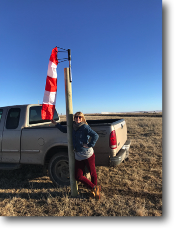 Anne helped install Dad's new third-anniversary windsock this year.