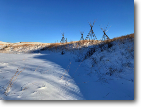Snowy view of the wicoti tipis.