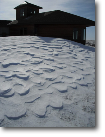 Scalloped snow drift pattern.