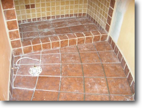Bathroom and shower floors tiled.