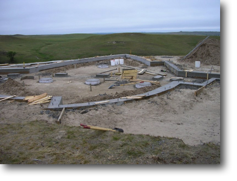 Foundation walls and column footings poured.
