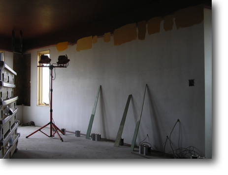 Rocking done--ceiling painted and testing wall colors.